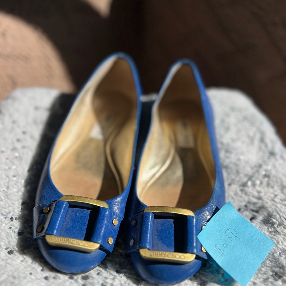 Used Jimmy Choo flats in electric blue color. Size 38. 💯 % Authentic